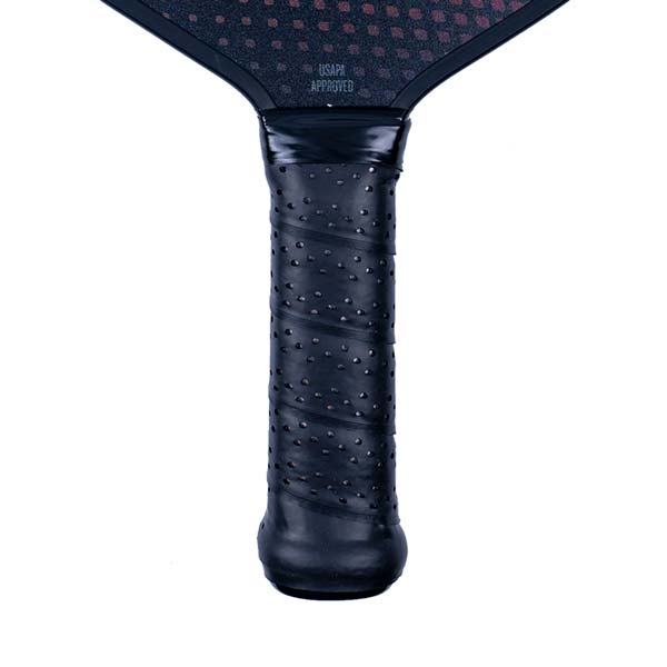 Close-up of a black pickleball paddle grip with a perforated texture and USAPA APPROVED text.