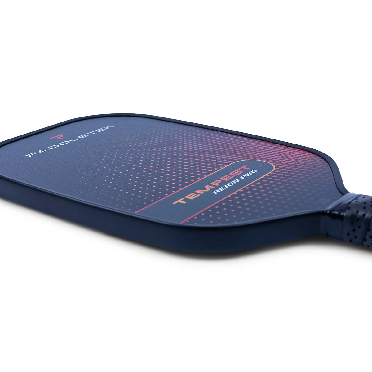 Side view of a navy pickleball paddle with PADDLETEK and TEMPEST REIGN PRO text and a red dot pattern.