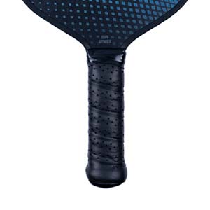 Close-up of a black pickleball paddle grip with USAPA APPROVED text.