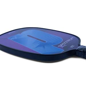 Side view of a blue and purple pickleball paddle with a large P graphic and SPECTRUM PRO text.