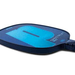 Side view of a blue pickleball paddle with a large blue P and SPECTRUM PRO text.