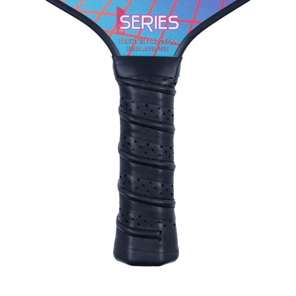 Close-up of a black pickleball paddle grip with perforations and the word SERIES visible.