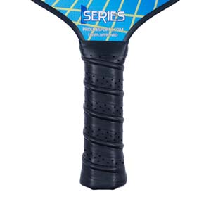 Close-up of a black pickleball paddle grip with perforated texture and SERIES text above.