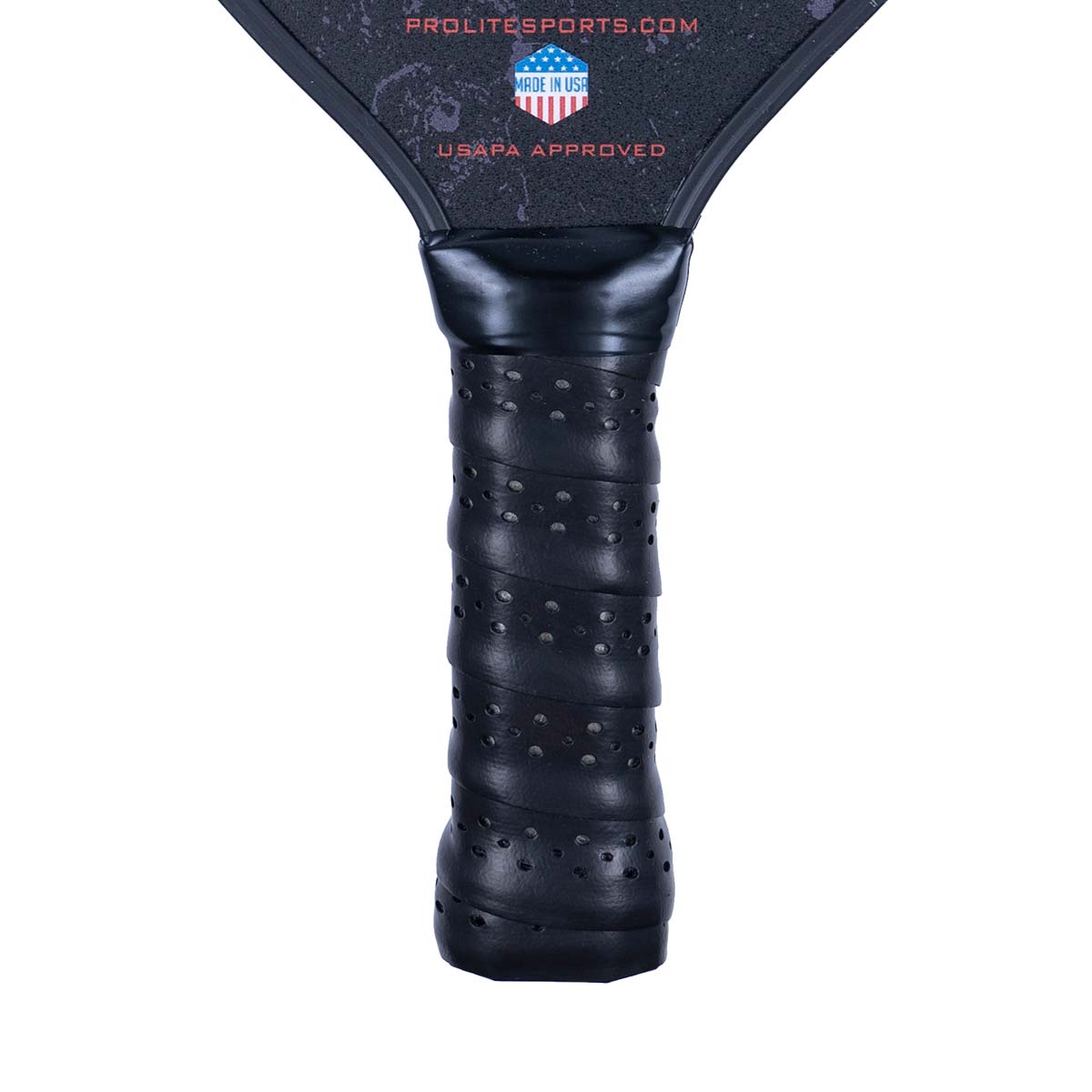 Close-up of a black pickleball paddle grip with perforations and USAPA APPROVED text.