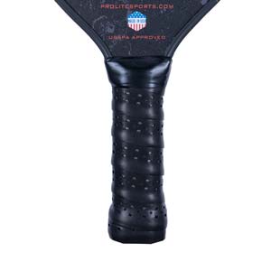 Close-up of a black pickleball paddle grip with perforations and USAPA APPROVED text.