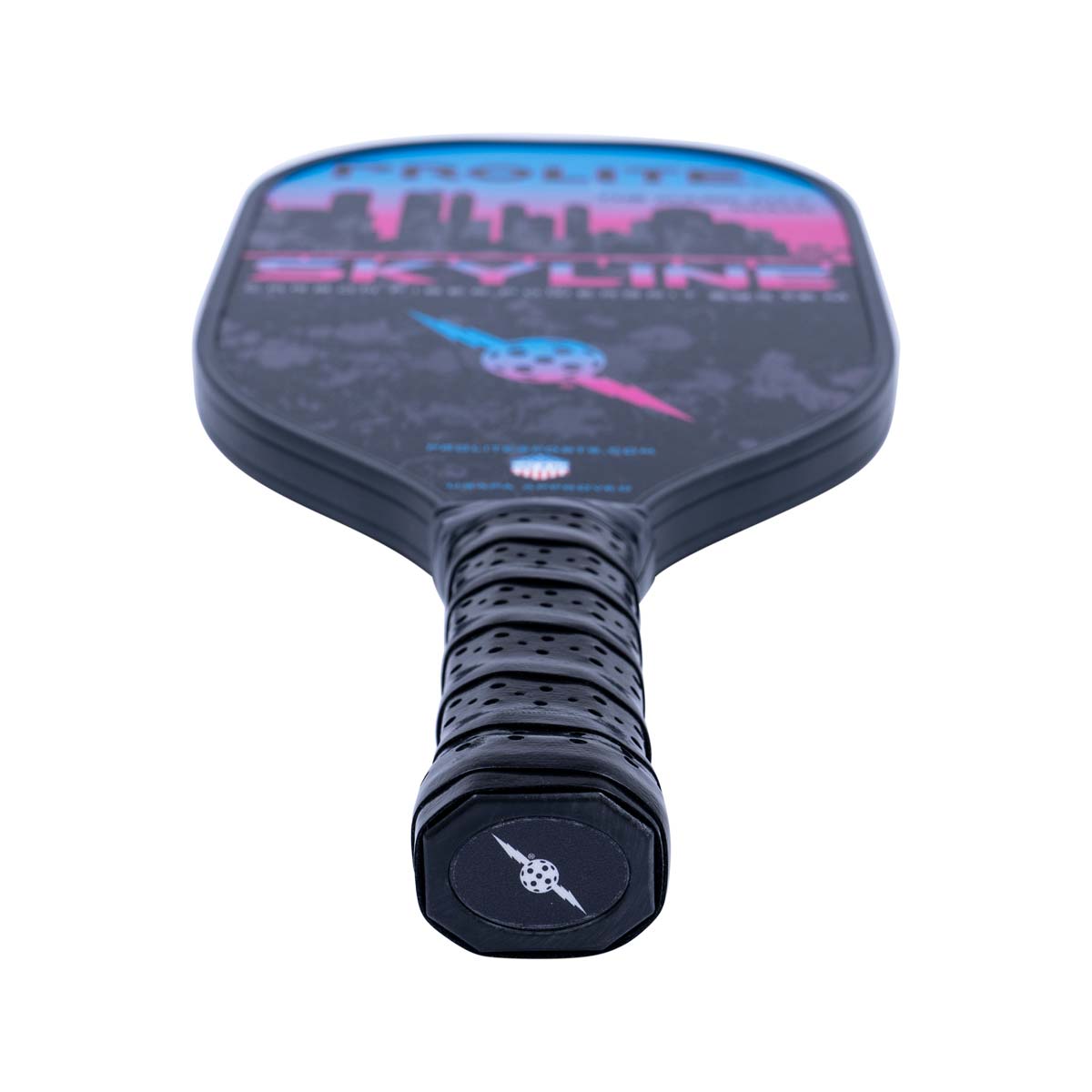 Top-down view of a black pickleball paddle with a skyline graphic, SKYLINE text, and a perforated grip.