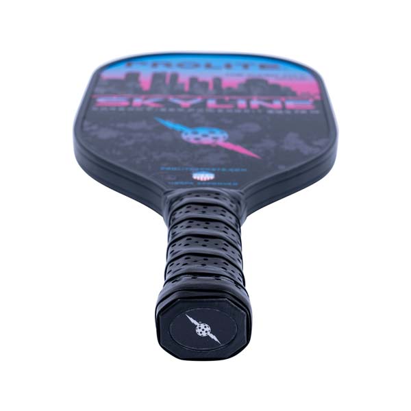 Top-down view of a black pickleball paddle with a skyline graphic, SKYLINE text, and a perforated grip.
