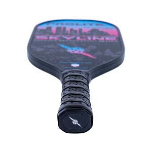 Top-down view of a black pickleball paddle with a skyline graphic, SKYLINE text, and a perforated grip.