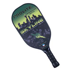 Top-down view of a black pickleball paddle with a Seattle skyline graphic and SKYLINE text.