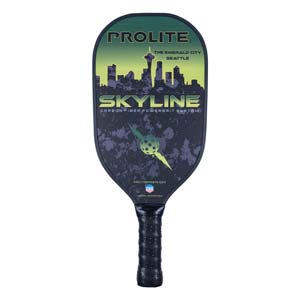 Front view of a black pickleball paddle with a Seattle skyline graphic, SKYLINE text, and a textured grip.
