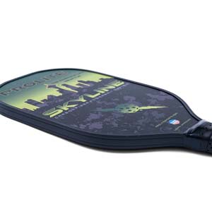 Corner view of a black pickleball paddle with PROLITE SKYLINE text and a Seattle skyline graphic.