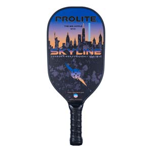Front view of a black pickleball paddle with a NYC skyline graphic, PROLITE and SKYLINE text, and a textured grip.
