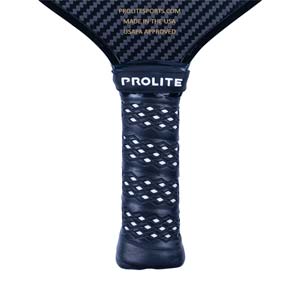 Close-up of a black pickleball paddle grip with white diamond pattern and PROLITE branding.