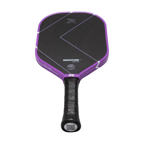 Angled front view of a black and purple pickleball paddle with white geometric lines, ProXR logo, and a black textured grip.