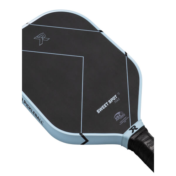 Angled view of a black ProXR pickleball paddle with light blue sweet spot lines, SWEET SPOT MAX text, and a light blue edge.