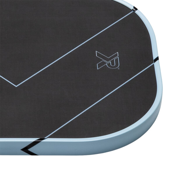 Close-up of a dark gray pickleball paddle with light blue lines, an XR logo, and a light blue edge guard.