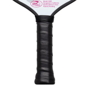 Close-up of a pickleball paddle grip showing the black textured handle and the "USA PICKLEBALL APPROVED" logo.