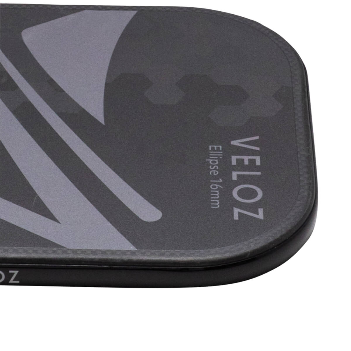 Corner view of a black VELOZ Ellipse 16mm product with a grey abstract pattern and carbon fiber texture.