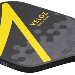 Corner view of the ProXR x Veloz Quadra paddle, showing the "VELOZ" logo, yellow stripe, and hexagonal pattern.