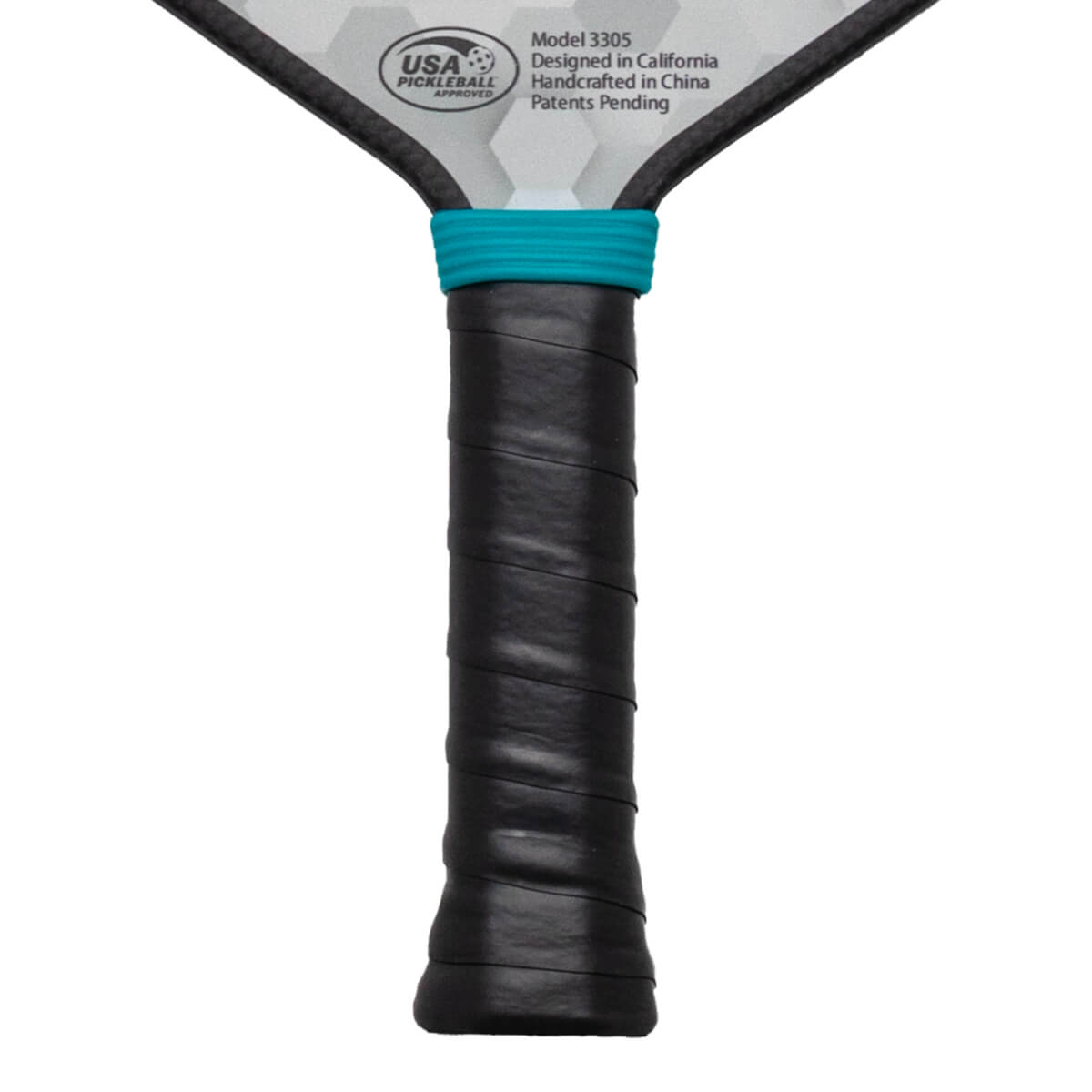 Close-up of a pickleball paddle handle with black grip tape and a teal band, showing "USA PICKLEBALL APPROVED" and "Model 3305".