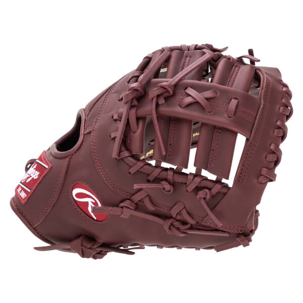Side view of a maroon Rawlings baseball glove with a red logo patch and "est. 1887" text.