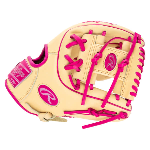 Top-down view of a tan baseball glove with bright pink lacing and Rawlings logos.