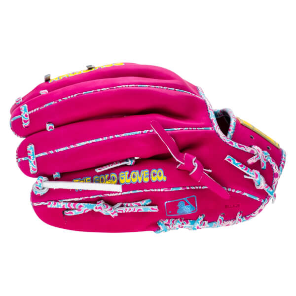 Side view of a bright pink baseball glove with blue and white patterned lacing and "THE GOLD GLOVE CO." embroidered in yellow.