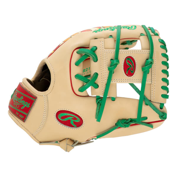 Side view of a tan Rawlings baseball glove with green laces and red accents, featuring the brand name "Rawlings" and "R" logo in metallic green.