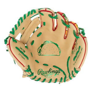 Front view of a tan baseball glove with green laces and red trim, featuring a green metallic taco graphic above the Rawlings logo in the palm.