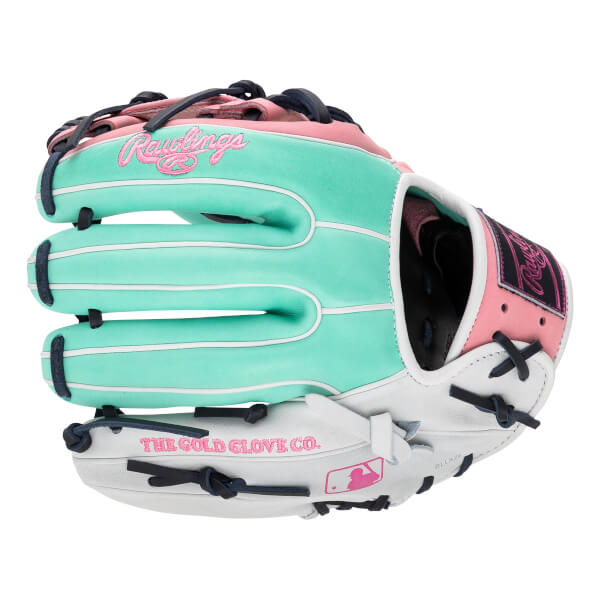 Back view of a mint green, pink, and white baseball glove with navy laces, featuring the pink "Rawlings" logo and "THE GOLD GLOVE CO." embroidery.