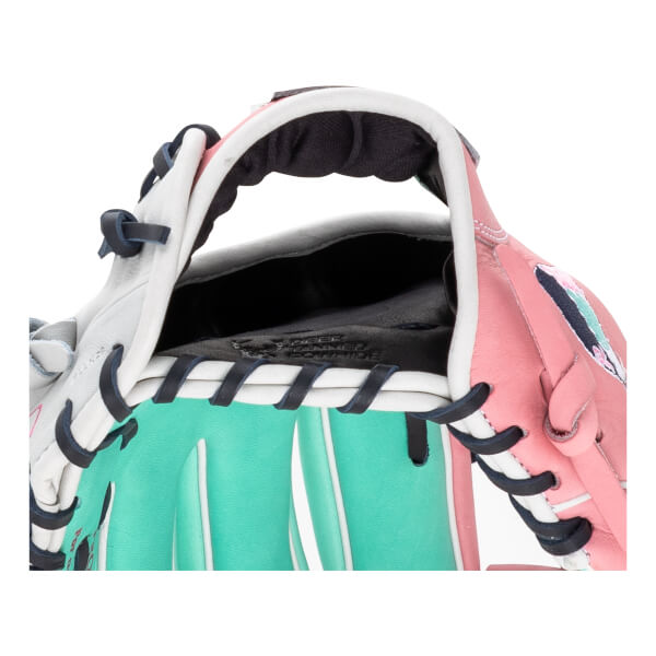 Close-up of the wrist opening features white, teal, and pink leather with navy laces and "DEER TANNED COWHIDE" embossed on the black interior lining.