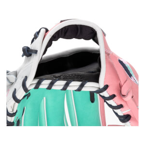 Close-up of the wrist opening features white, teal, and pink leather with navy laces and "DEER TANNED COWHIDE" embossed on the black interior lining.