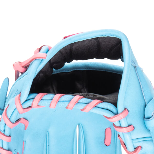 Close-up of a light blue baseball glove with pink lacing and a black padded interior.