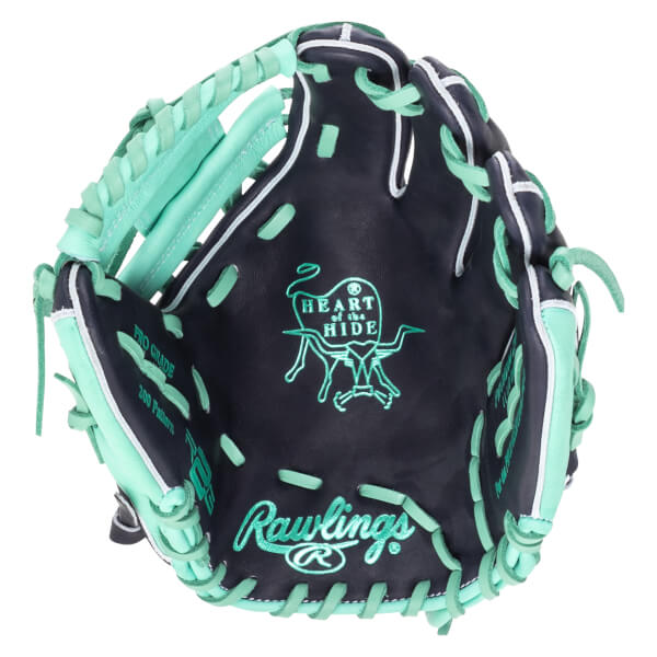 Top-down view of a navy baseball glove with mint green lacing and stitching, featuring the Rawlings logo and "Heart of the Hide" emblem.