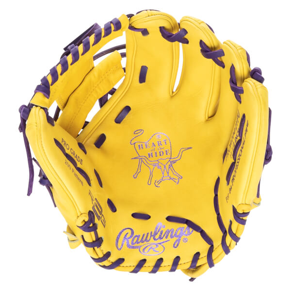 Top-down view of a yellow baseball glove with purple lacing, featuring the Rawlings logo and "Heart of the Hide" branding.