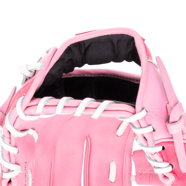 Close-up of a pink baseball glove showing white lacing and the words "For the T".