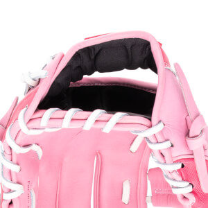 Close-up of a pink baseball glove showing white lacing and the words "For the T".