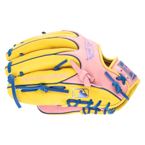 Side view of a pink and yellow baseball glove with blue lacing, featuring "THE GOLD GLOVE CO." text and an MLB logo.
