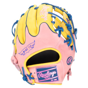 Front view of a pink and yellow Rawlings baseball glove with blue lacing and "Wing Tip" detail.