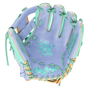 Interior view of a light purple baseball glove with mint green lacing and gold trim, showing the Rawlings logo and "HEART OF THE HIDE" emblem.