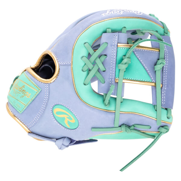 Side view of a light purple baseball glove with mint green accents, gold trim, and a Rawlings logo.