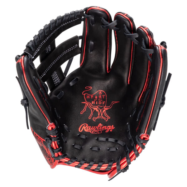 Inside view of a black baseball glove with red stitching and trim, showing the "Heart of the Hide" logo and "Rawlings" text.