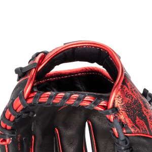 Close-up of a black baseball glove with red metallic accents and black lacing.