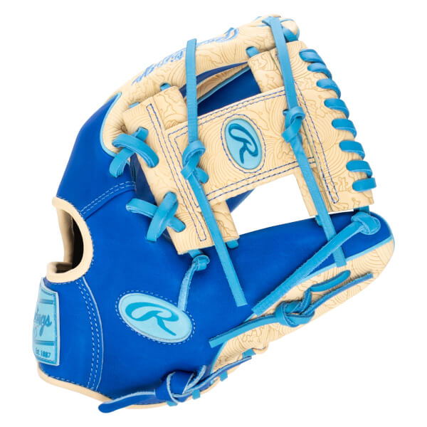 Front view of a blue baseball glove with tan accents, featuring a Rawlings logo and "Est. 1887" text.