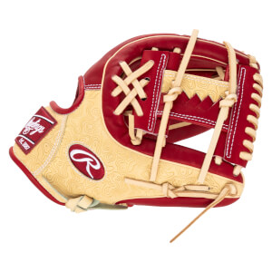 Side view of a red and tan Rawlings baseball glove with a topographic pattern and "Est. 1887" text.