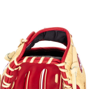 Close-up of a red and tan baseball glove, showing the padded interior and tan lacing.