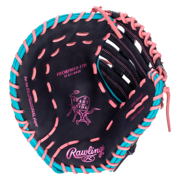 Top-down view of a navy baseball glove with pink and teal lacing, featuring Rawlings and "Heart of the Hide" logos.