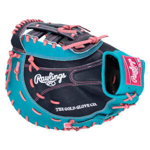 Top-down view of a navy and teal baseball glove with pink lacing, featuring "Rawlings" and "THE GOLD GLOVE CO." text.