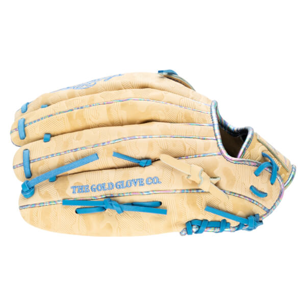 Side view of a tan baseball glove with blue lacing and iridescent trim, showing "THE GOLD GLOVE CO." embroidery.