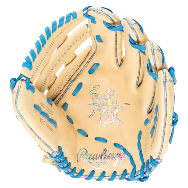 Top-down view of a tan baseball glove with blue lacing, "Rawlings" logo, and "Heart of the Hide" emblem.